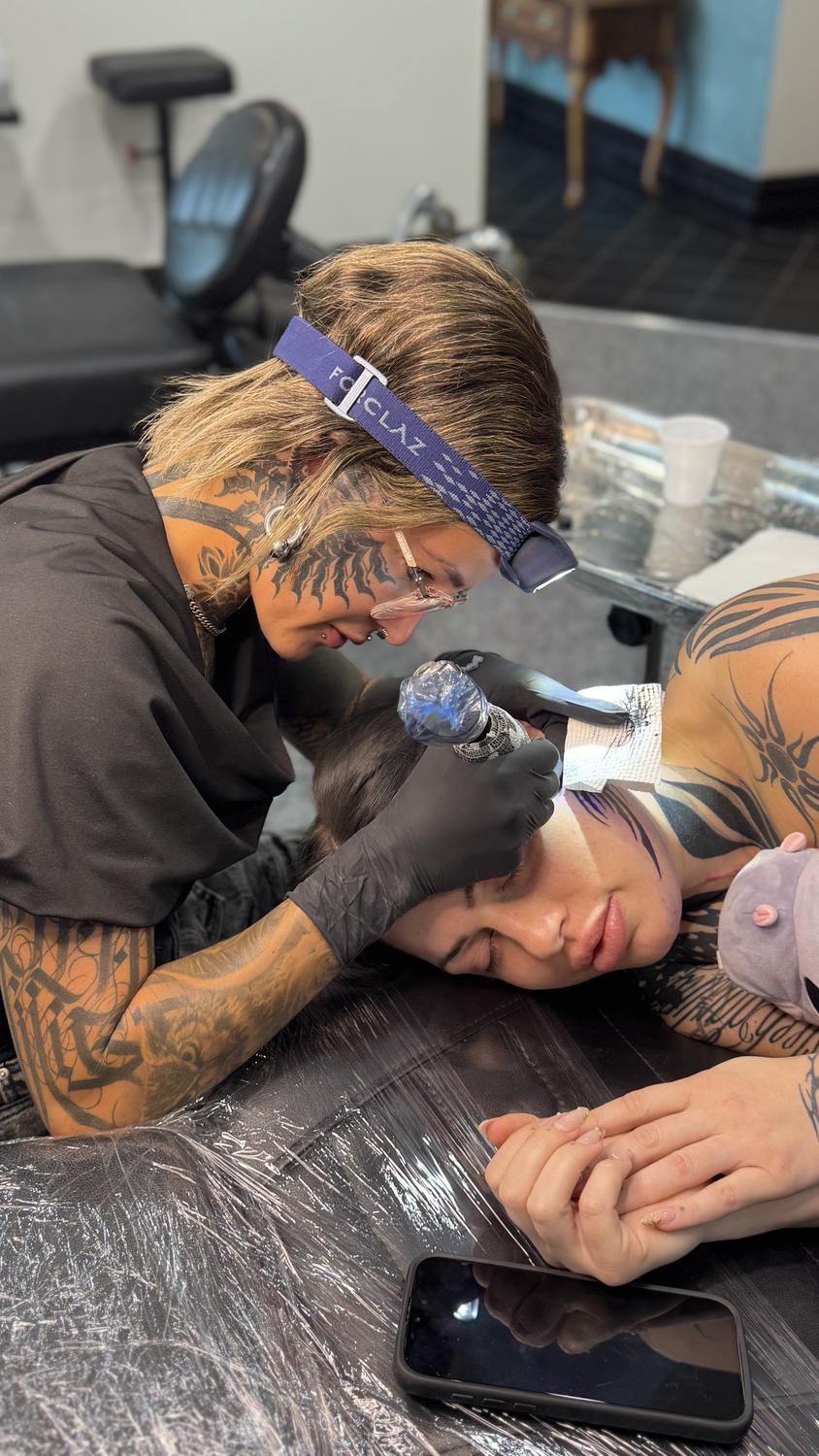 Close-up of a face tattoo in progress at Mother Goose Tattoo